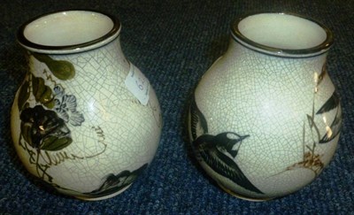 Lot 622 - A pair of Japanese porcelain small crackle-glazed baluster vases, Meji period, decorated with birds
