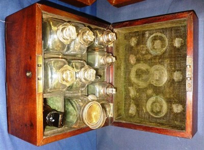 Lot 625 - An early 19th century mahogany apothecary box containing glass bottles and funnel, 21.5cm by 17cm