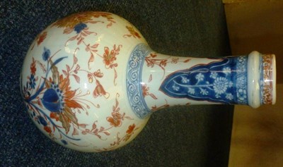 Lot 631 - A Chinese Imari porcelain bottle vase, decorated with underglaze blue and overglaze iron with...
