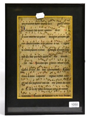 Lot 1050 - A framed piece of manuscript