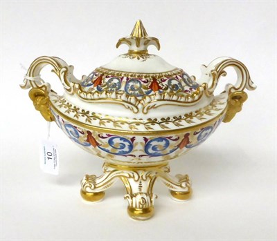 Lot 10 - * An early 19th century English porcelain boat shaped sauce tureen and cover with classical...