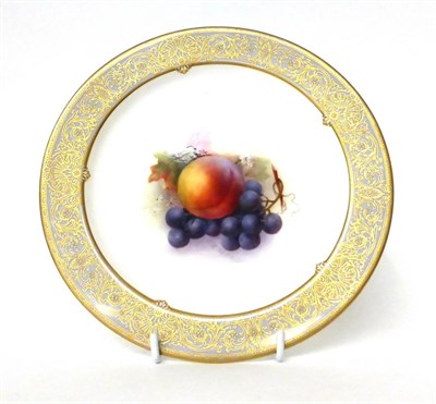 Lot 31 - * A Royal Worcester plate, painted by R Sebright with fruit, 22cm