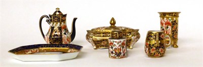 Lot 35 - * A Royal Crown Derby miniature Imari pattern coffee pot and cover; a similar mug; canister and...