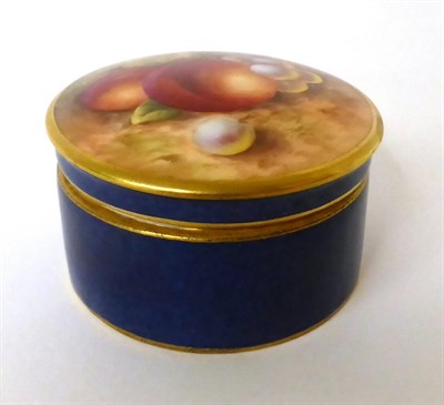 Lot 36 - * A Royal Worcester blue ground circular box and cover painted with fruit by Roberts