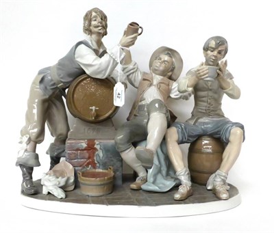 Lot 42 - * A Lladro figure group of topers, 38cm high