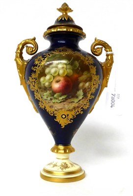 Lot 43 - * A Coalport blue ground twin-handled urn shaped vase and cover, painted with fruit by Chivers,...