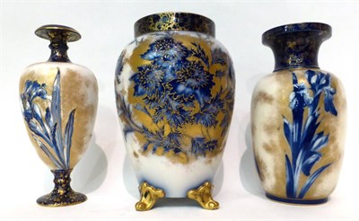 Lot 67 - * A Royal Doulton Flow Blue baluster vase, 23.5cm high; and two similar ovoid vases, 23cm high