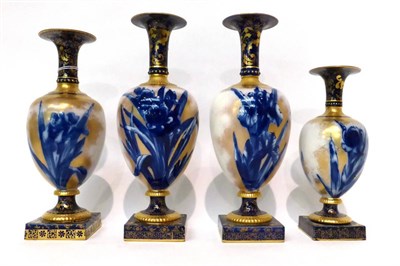 Lot 68 - * A pair of Doulton Lambeth Flow Blue vases with square section vases, 28cm; and two smaller...