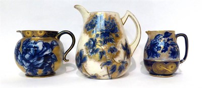 Lot 69 - * A Doulton Burslem Flow Blue jug, 20.5cm; and a similar jug, 14cm; and and a similar jug, 13cm