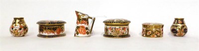 Lot 83 - * A Royal Crown Derby Imari pattern heart shaped box and cover, 5.5cm; two similar circular...