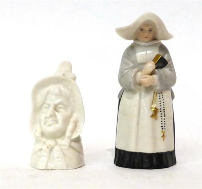 Lot 84 - * A Royal Worcester porcelain candle extinguisher as a nun, 9.5cm high; and a similar example...