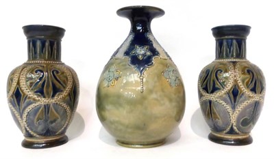 Lot 88 - * A pair of Doulton Lambeth stoneware vases by Florence E Barlow, dated 1878, incised with...