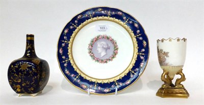 Lot 103 - * A Minton cabinet plate decorated with a classical cameo, 25cm; a similar blue ground bottle...