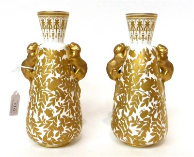 Lot 110 - * A pair of Royal Crown Derby baluster vases with animal handles gilt with birds amongst...