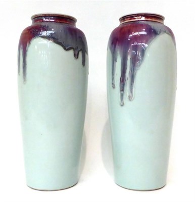 Lot 112 - * A pair of Japanese pale blue glazed baluster vases with Sang de Boeuf glazes, 30cm high