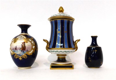 Lot 119 - * A Royal Crown Derby blue ground ovoid vase, painted by W E Dean with a shipping scene, 11cm;...