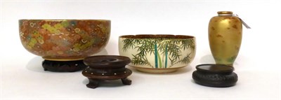 Lot 126 - * A Satsuma low bowl decorated with a landscape, 16cm; a similar bowl with flowers, 18cm; and a...