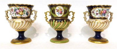 Lot 130 - * A pair of Copeland blue ground twin-handled campana vases decorated with exotic birds in...