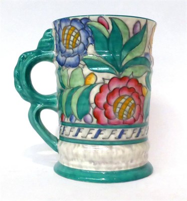 Lot 138 - * A Charlotte Rhead Crown Ducal mug with tubelined decoration of flowers, 18.5cm high