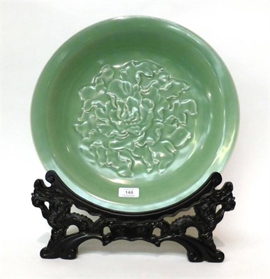 Lot 148 - * A Chinese celadon glazed charger and stand, 40cm diameter