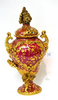 Lot 157 - * A late 19th century Continental red ground and gilt decorated twin handled vase (a.f.), 44cm high