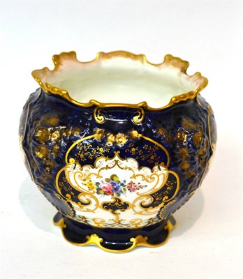 Lot 159 - * A Royal Crown Derby blue ground and floral decorated planter, 16cm diameter