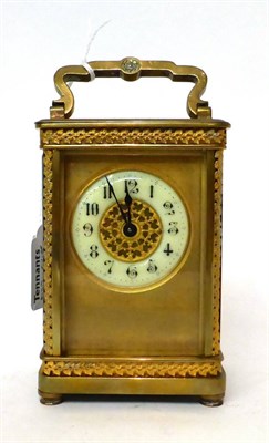 Lot 172 - * A brass carriage timepiece, circa 1910, carrying handle, enamel Arabic chapter ring, single...