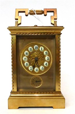 Lot 179 - * A brass striking and repeating alarm carriage clock, 20th century, carrying handle, repeat...