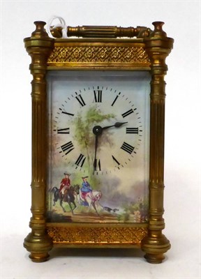 Lot 181 - * A brass carriage timepiece, circa 1910, carrying handle, enamel dial with Roman numerals and...