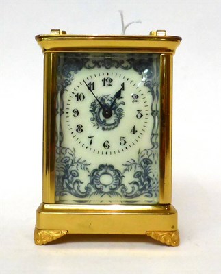 Lot 183 - * A brass carriage timepiece, circa 1900, carrying handle, enamel dial with Arabic numerals and...