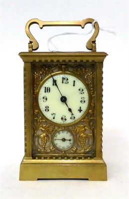 Lot 185 - * A brass alarm carriage timepiece, circa 1910, carrying handle, enamel dial with Arabic...