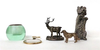 Lot 221 - * A filled silver dog, a small match ball, a silver stag and dog and a magnifier