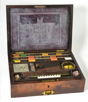 Lot 231 - A 19th Century rosewood artists box with contents, the interior of the lid with embosed leather and