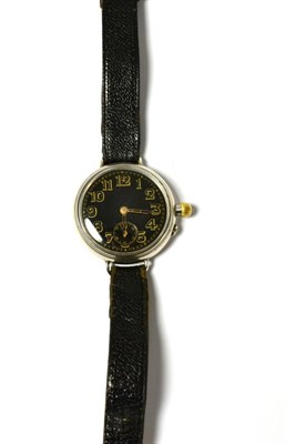 Lot 241 - A first world war period silver wristwatch, 1916, lever movement, black enamel dial with Arabic...