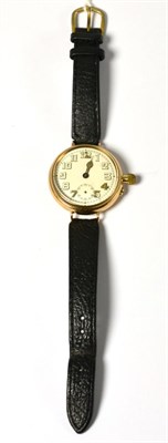 Lot 259 - A 9ct gold gents wristwatch, 1919, lever movement, enamel dial with Arabic numerals, seconds...