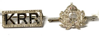 Lot 272 - A Naval brooch, inset with diamonds, length 3.3cm and an initial brooch, depicting letters 'KRR' in