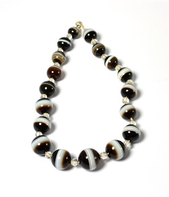 Lot 278 - A graduated sardonyx and clear bead necklace, length 40cm