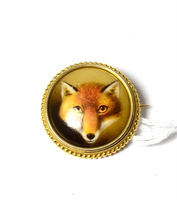 Lot 282 - A painted fox mask circular brooch, the reverse of the painted panel marked 'W B Fod 1872', in...