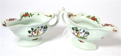 Lot 311 - A pair of early first period Worcester porcelain sauceboats, circa 1754, of shaped oval form,...