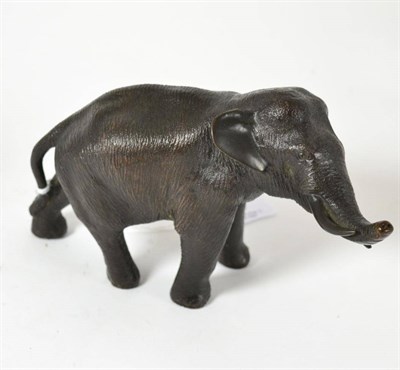 Lot 328 - A Japanese bronze figure of an elephant, Meiji period, character mark to underside of foot,...