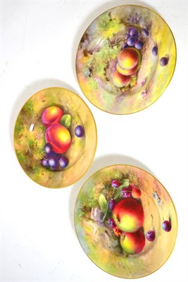 Lot 339 - Three Royal Worcester porcelain tea plates, painted by Lockyer, Austin and Townsend with fruit,...