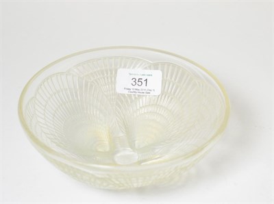 Lot 351 - A René Lalique Coquilles opalescent and clear glass bowl, No.3203, the underside moulded with four