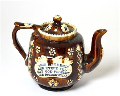 Lot 359 - A 19th century Bargeware teapot