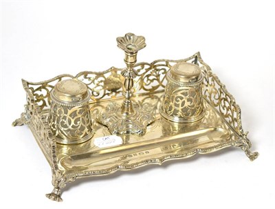 Lot 361 - A silver inkstand, Edward & John Barnard, London 1856, with a pierced gallery, two inkwells...