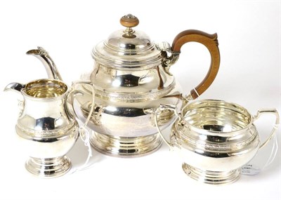 Lot 363 - A three piece silver tea service, Birmingham 1932