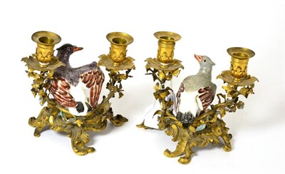 Lot 367 - A pair of 19th century French ormolu two branch candlesticks, surmounted by birds, 15cm high