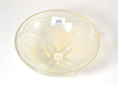 Lot 376 - A René Lalique Coquilles opalescent and clear glass bowl, No.3201, the underside moulded with four