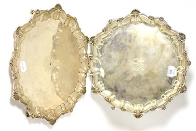 Lot 379 - A silver salver, probably Elkington & Co, Birmingham 1809, with C scroll border and shell...