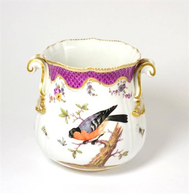 Lot 385 - A Meissen style cache pot painted with birds below a puce scale border, 17cm high