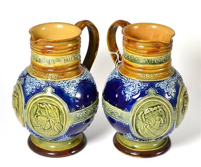 Lot 387 - ~ A pair of Royal Doulton stoneware Queen Victoria commemorative jugs, 24cm high